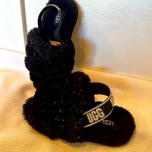 Ugg black with shimmer speck youth size 11. No treadmark wear and tear.